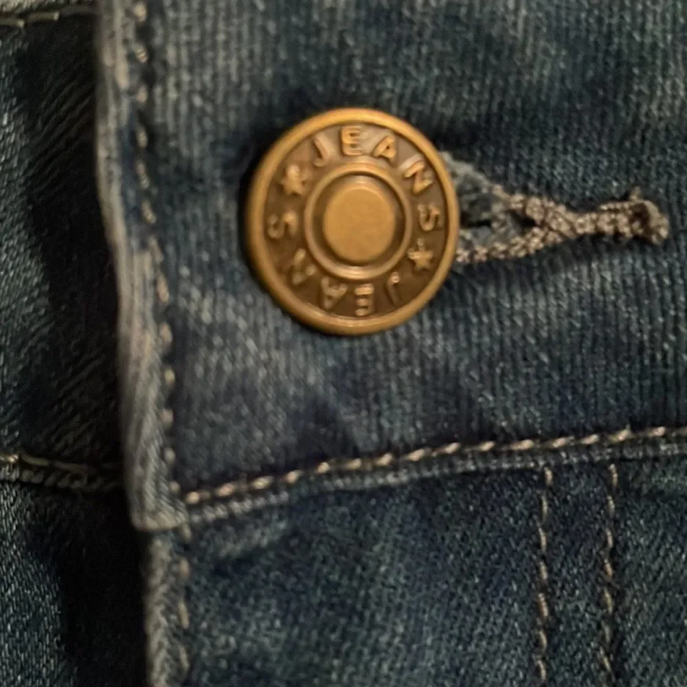 Size large cut off Jean shorts with fraying